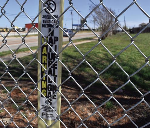 An Oklahoma Natural Gas pipeline sign is shown in Oklahoma City on Tuesday, March 12, 2024. Paul Monies/Oklahoma Watch