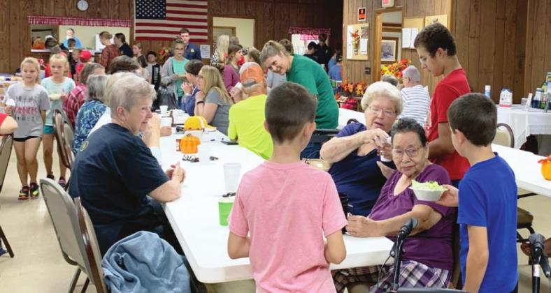 Under the supervision of Supt. Shelly Beach, Maysville 4-H and FFA members prepared and served lunch at the local senior citizens center last Thursday. The members not only prepared, cooked and served the meal, they entertained the group as well. News Star Staff Photo by Suzanne Mackey