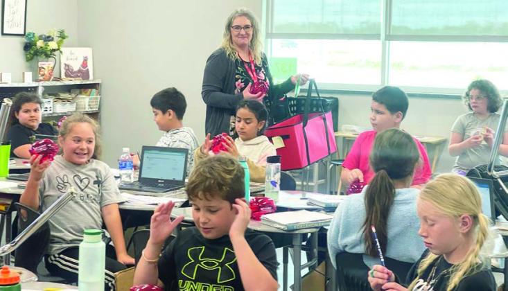 Third-grade students at Pauls Valley Elementary School learned about saving their money last week as part of a “Teach Children to Save Day” presentation by Pauls Valley’s First United Bank employees. Students watched a video about how U.S. coins are minted, identified a variety of coins and the value of each, discussed the difference between needs and wants and learned about developing the habit of saving money for things they want. Each student also received a complimentary piggy bank.