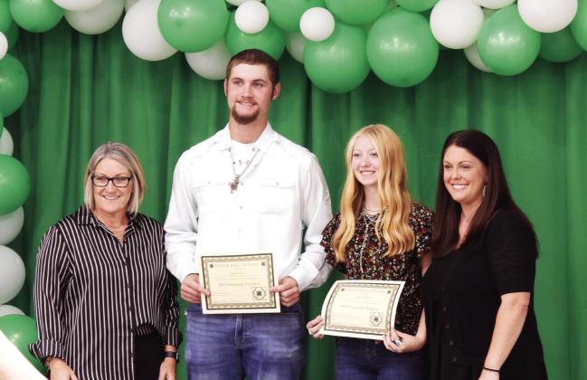 Legend Fowler, of Elmore City, and Megan Dutton, of Lindsay, were recognized as the 2025 Garvin County 4-H Hall of Fame honorees during the 4-H Achievement Banquet Sunday. News Star photo by Chris Mackey