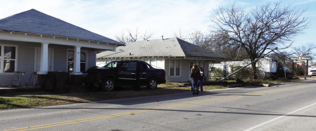 A street light, a telephone pole and the porch supports on two houses along State Highway 19 in Maysville were damaged Dec. 7 after a driver suffering from a medical emergency ran off the road near Oak and Williams Streets. News Star photo by Chris Mackey
