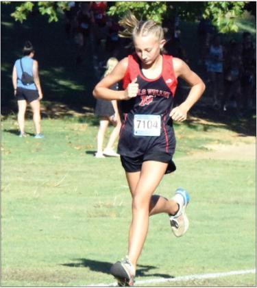 Pauls Valley’s Heidi Schroeder placed first in the 1.6-mile run to help her junior high team to a second place finish at Velma-Alma Tuesday. News Star photo by Don Coffey