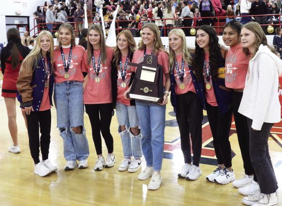 Pauls Valley’s cross country team with their State Championship trophy during a district-wide pep assembly Tuesday. Left to right: Kenzi Readnour, Amari English, Rachel Hamilton, Ella Miller, Laney English, Keira Readnour, Isabella Gutierrez, Katie Barahona and Kaitlin Rains. News Star photo by Chris Mackey