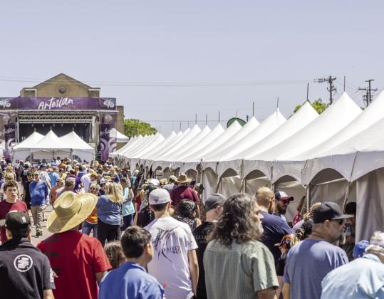 Art patrons at the 2024 Artesian Arts Festival. The 2025 Artesian Arts Festival is set June 7 at the Artesian Plaza, adjacent to the Artesian Hotel and Spa, 1001 W. First St., Sulphur. Courtesy photo