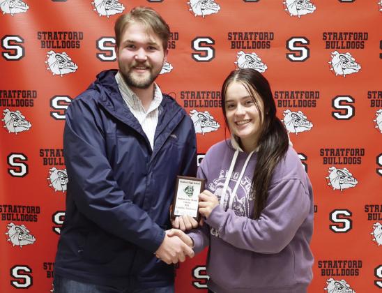 Caleb Stout of Oklahoma Heritage Bank presents Lundyn Anderson with her student of the month award. Anderson, a senior at Stratford High School, is the daughter of Tammy and Willy Anderson.