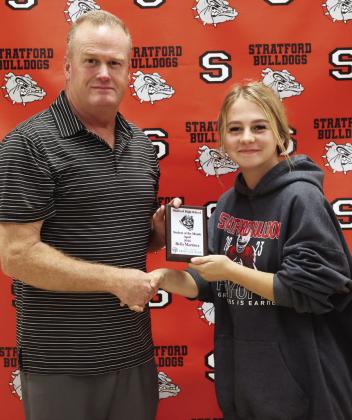 Stratford senior Bella Martinez receives the April student of the month award from High School Principal Paul Savage. Courtesy photo