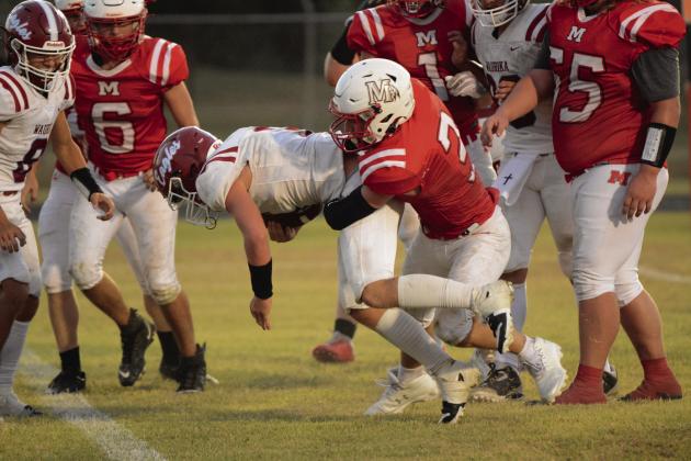 Maysville’s Josh Wilson tackles a Waurika Eagle during last week’s 58-8 loss. The Warriors have a bye this week to prepare for the start of district play next week. News Star photo by Denny Park
