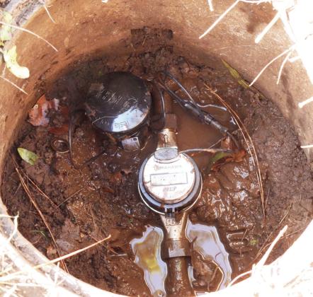 Crews have begun installing new water meters on the northeast side of Pauls Valley. The new meters, which will eventually be installed citywide, are more accurate and can be read remotely from the street. News Star photos by Chris Mackey