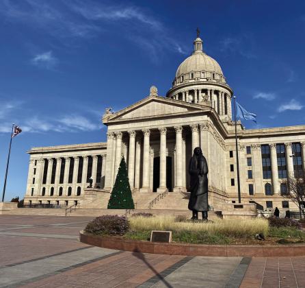The Oklahoma Capitol, with a Christmas tree in front, is shown in this Wednesday, Dec. 4, 2024, photo. Paul Monies/Oklahoma Watch