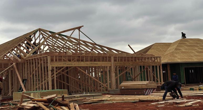 Construction workers frame a duplex in Tuttle, being built by Silva Development as part of Oklahoma's new Housing Stability Program. Heather Warlick/Oklahoma Watch