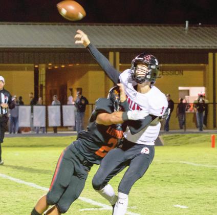 Lindsay’s Ty Ferguson tackles the Tishomingo quarterback. Photo by Kristy Schrader