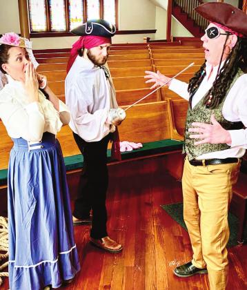 The Garvin County Choral Society & Sinfonietta is performing Gilbert & Sullivan’s “The Pirates of Penzance” Sunday, April 24, at 2 p.m. at the Pauls Valley High School auditorium. Local cast members include, from left, Holley Sanders, Geoffrey Carlton and Steve Freeman, all of Pauls Valley. Photo courtesy of Peggy Patton