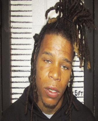 One in custody after shooting at local convenience store