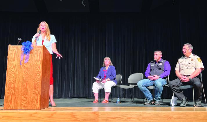 State Sen. Kendal Sacchieri (left) speaks to Pauls Valley Junior High students during a Constitution Day assembly Wednesday. Joining Sacchieri on stage were (l-r) PVJH staff April Brown, Sen. Jonathan Wingard and Garvin County Sheriff Jim Mullett. News Star photo by Suzanne Mackey