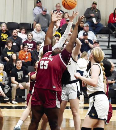 The Wynnewood Lady Savages played a tough game against the Roff Lady Tigers last Friday night. Wynnewood’s Annika Pittman grabs another rebound in the Lady Savages 60-43 loss. The Lady Savages played Asher this week in their final regular season game, losing 55-20. News Star photo by Don Coffey