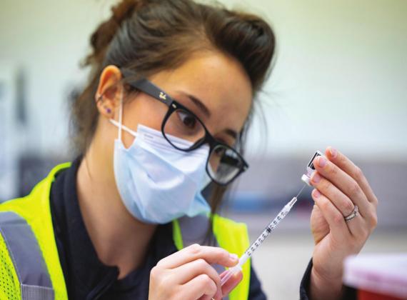 The COVID vaccine is based on mRNA technology that shares a message with the body’s cells to identify and fight the CoV-2 virus. Photo by Todd Johnson, OSU Agricultural Communications Services