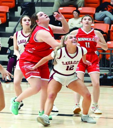 Wynnewood’s Lady Savages competed at the Longhorn Classic in Alex last weekend. Lady Savage Addie Rozzell blocks two Ninnekah players for a rebound. News Star photo by Don Coffey