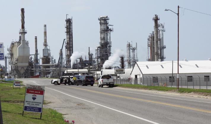 U.S. Highway 77 in Wynnewood was closed for several hours Tuesday morning due to a fire at the Wynnewood refinery that resulted in critical injuries to two plant employees.