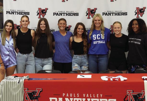 Pauls Valley senior Isabelle Hicks poses with her Lady Panther teammates Sept. 18 after signing a letter of intent to play collegiate softball for the Southwestern Christian University Eagles in Bethany next year. News Star photo by Chris Mackey