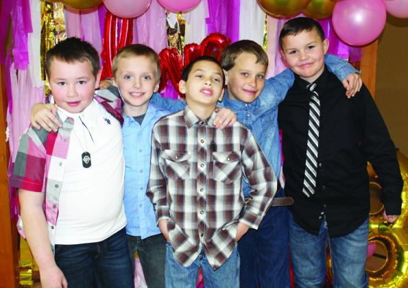 Stratford third grade students Jacob Cantrell, Mayson Hinkle, Austin Dial, Triston Waling and Phoenix Scoggins pose for a Valentine’s Day photo during their etiquette dinner celebration last week. Photo courtesy of Lindsey Abney. 