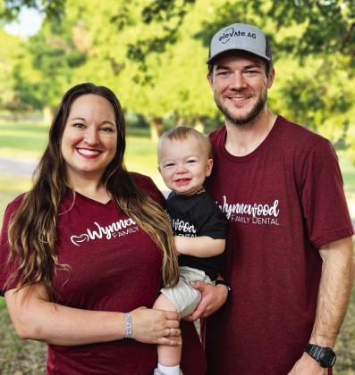 Mary Temple-Goins with her husband, Michael, and their son. Courtesy photo