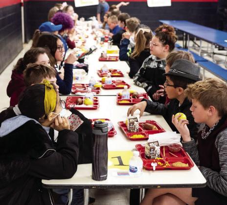  Weatherford elementary students are seen eating lunch in the school's cafeteria. (Whitney Bryen/Oklahoma Watch)