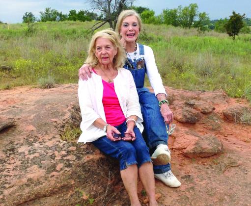 Twila June Adams, left, and Betty Sue Adams, enjoy the beauty of their original allotted land outside of Lindsay, Oklahoma. Photo courtesy of Chickasaw Nation