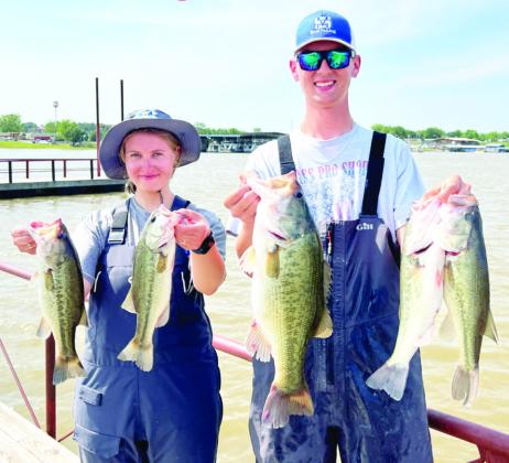 Murray State College Bass Fishing Team Duo, Paris McCullers and Fisher Hill, show off their winning catches of the tournament. Courtesy Photo