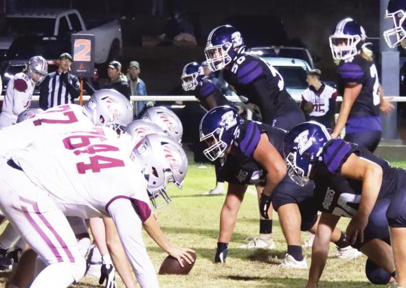The Badger defense holds the Oklahoma Christian Academy offense scoreless in the second half of the first-round playoff game last Friday. Badgers move to the second round of the playoffs with the 42-20 victory. Photo by Chris Mackey
