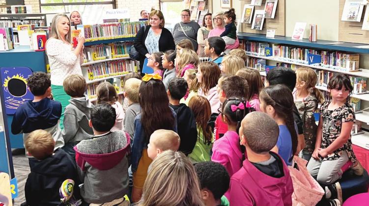First-graders from Whitebead Schools took a field trip to the Nora Sparks Warren Library in Pauls Valley on Tuesday. They learned how to navigate the library, check out a book, and got a preview of the upcoming Summer Reading Program.