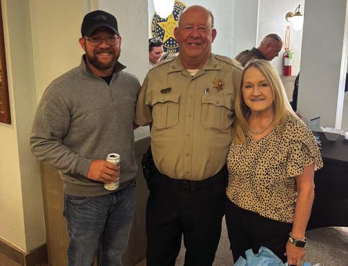 Deputy Jeff Jarman (center) with his wife and son during Wednesday’s retirement reception at the Garvin County Courthouse. Photo courtesy of James Richardson