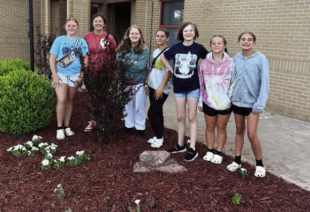 The sixth grade horticulture class at Maysville Elementary school recently cleaned up and planted new flowers in the flower bed in front of the elementary school. Courtesy photo