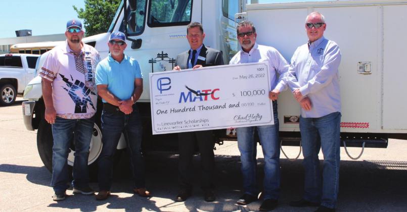 Left to right, Bruce Beam, MATC Lineworker Technology teacher; Larry Sneed, Director of Safety & Training Imperium Utility Services; Mike Eubank, MATC Superintendent; Chad Hefty, founder and owner, Center Phase Energy; and Michael Thornton, President Imperium Utility Services.
