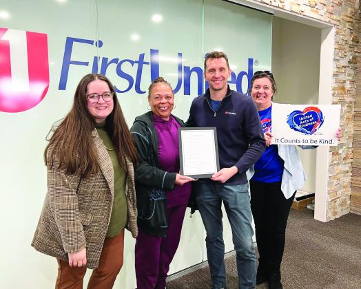 Pauls Valley Mayor Jocelyn Rushing (second from left) presents a proclamation from the city declaring Feb. 17 as “United Acts of Kindness Day” to First United Bank representatives Grace Farnan, J.D. Bostic and Della Wilson. News Star photo by Suzanne Mackey