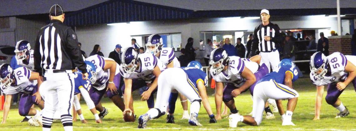The Badgers and Blue Demons wait for the snap during the A-4 District Championship game last Friday night.