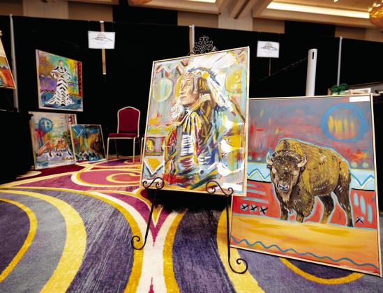 The Chickasaw Nation invites First American artists to share creative works at Hustola Art Market. Paintings pictured by Chickasaw artist Tyson Hudson during the 2023 Hustola Art Market. Applications for 2024 are available at HushtolaArtMarket.com.