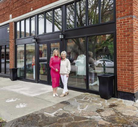 Business owner Madeline Jack Little and her mother, Julie Jack, at 3rd and Broadway, which reopened in a new location almost a year after the original building was razed by a tornado. Courtesy photo