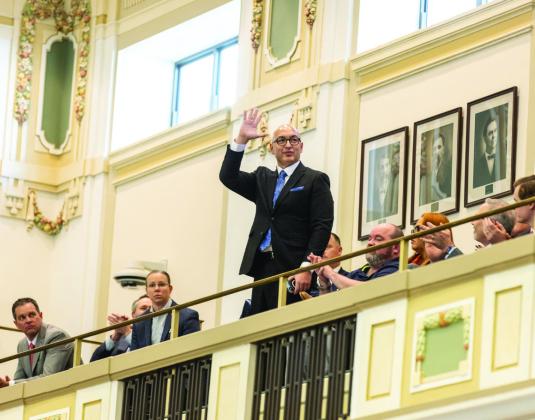 John Standfill stands and waves after being recognized during Gov. Kevin Stitt’s State of the State address on Feb. 3, 2025. Standfill, who spent 17 years in Oklahoma prisons and was released in 2022 on parole, reports owing tens of thousands of dollars in court fines and fees. Stitt said Standfill’s story is an example of the need for court fines and fees reform. Provided photo/Legislative Services Bureau