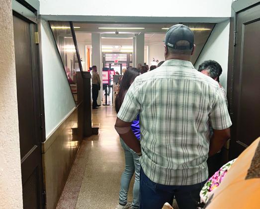Voters lined up at the Garvin County Courthouse Wednesday for early voting
