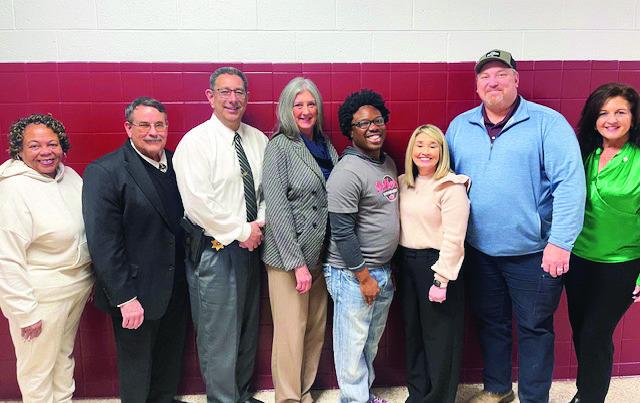 Elected officials from across the county participated in an MLK holiday event celebrating community service Jan. 17 in Wynnewood. Pictured l-r are Pauls Valley Mayor Jocelyn Rushing, Wynnewood Mayor Keith Huitt, Garvin County Sheriff Jim Mullett, Rep. Cynthia Roe, event organizer Jokori Taylor, County Clerk Lori Fulks, Dist. 2 County Commissioner Tom Pyle and Rep. Tammy Townley. Courtesy photo