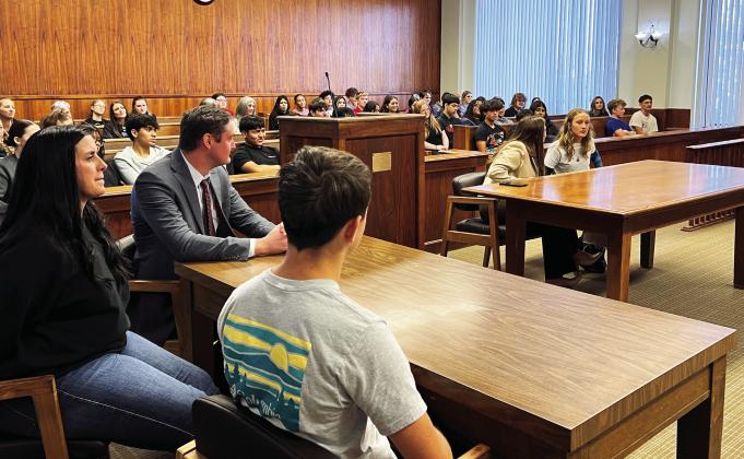 PVJH student Kaia Bostic (far right) works with Assistant District Attorney Madison Homer to serve as the prosecutor during a mock trial exercise at the Garvin County Courthouse Oct. 29. Student Zane Putnam (center) played the role of defense attorney to suspect “Robin Banks” (far left), as classmates watch from the gallery. Putnam was assisted by local attorney Jacob Heskett. News Star photo by Suzanne Mackey