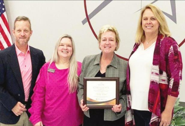 Attending the BISCert Pro graduation ceremonies at Gordon Cooper Technology Center in Shawnee were Wade Jarlsberg, MATC BIS Director; Lori Broyles, OCDTE Regional Coordinator; Kelly Reed, MATC Coordinator of Adult Short-term Programs and BISCert Pro graduate; and Cara Laverty Pattison, ODCTE Regional Coordinator.