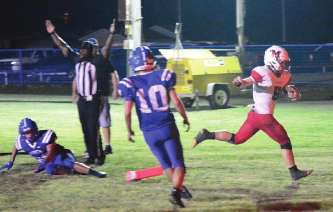 Maysville’s Nigel Reid rushes for a touchdown against Paoli.