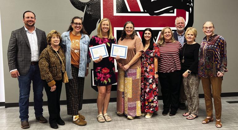 The Pauls Valley Foundation for Academic Excellence presented The Colley Family Grant to Pauls Valley Elementary School counselor Katie Sparks Tuesday. The grant was one of more than 50 awarded by PVFAE to teachers in the Pauls Valley and Whitebead school districts this year to fund classroom projects. Pictured left to right are Lorin Jacobson, Bonnie Beadles, Erin Colley Babcock, Katie Sparks, Anna Colley Newton, Tiffany Prince, Amanda Hammonds, Joey Freeland, Debra Ely and Lou Street.