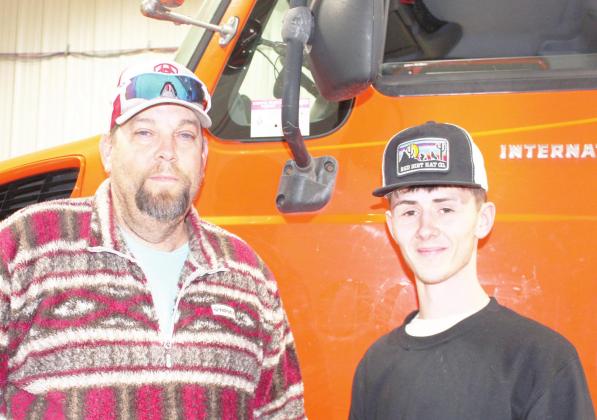MATC Lineworker Technology teacher Bruce Beam and Dylan Moore on Moore’s last day of class. Courtesy Photo