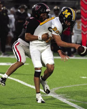 Josh Capuchino forces a Madill fumble during Pauls Valley’s 35-0 win over the Wildcats Friday night. Photo by Mike Arie