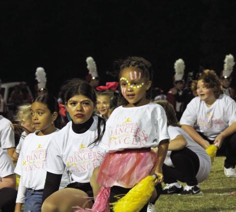 Pom camp participants dazzle halftime crowd