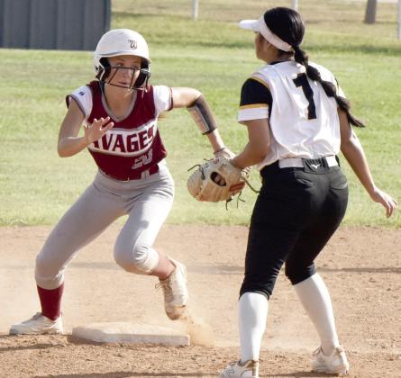 Wynnewood’s Charlee Minton rounds second base in the Lady Savages’ win over Calera, 7-0. News Star photo by Don Coffey