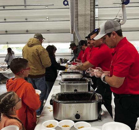 Pauls Valley firefighters serve chili to area residents during Saturday’s 25th annual Fire Department Chili Supper. Proceeds from the dinner support the local fire department. News Star photo by Suzanne Mackey