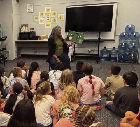 Rep. Cynthia Roe, R-Lindsay, reads to third- and fourth-grade students at Wayne Public Schools on Thursday, Sept. 10, for Read an Accurate Ag Book Week. Photo courtesy of Wayne Public Schools.